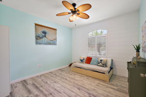 4th Bedroom w/ Shiplap Accent Wall, LVP Floor & Plantation Shutters