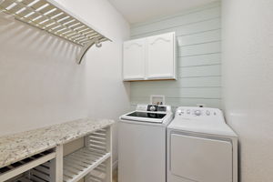 Spacious Laundry Room w/ Cabinet Storage & Shiplap Accent Wall