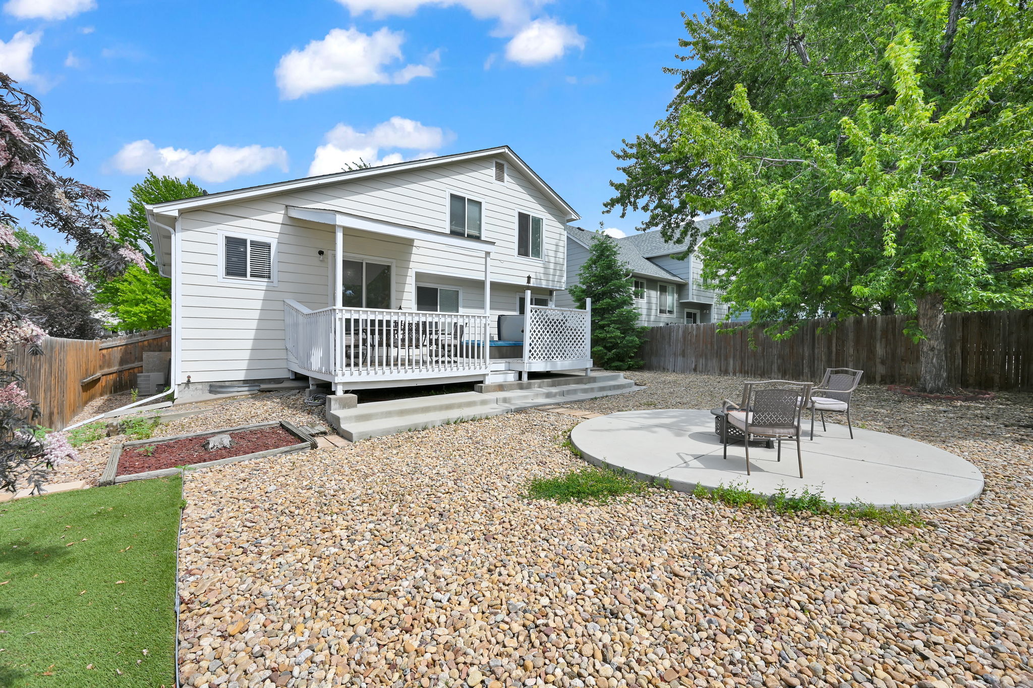 Low Maintenance Backyard with Firepit Area