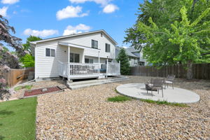 Low Maintenance Backyard with Firepit Area