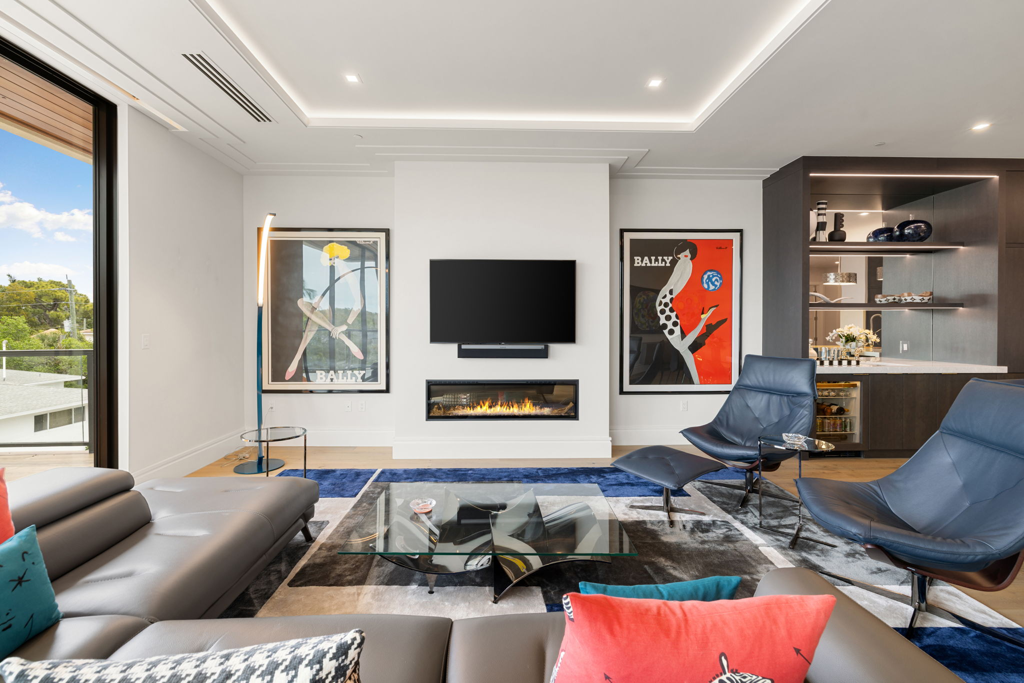 Great Room with Linear Fireplace and Wet Bar