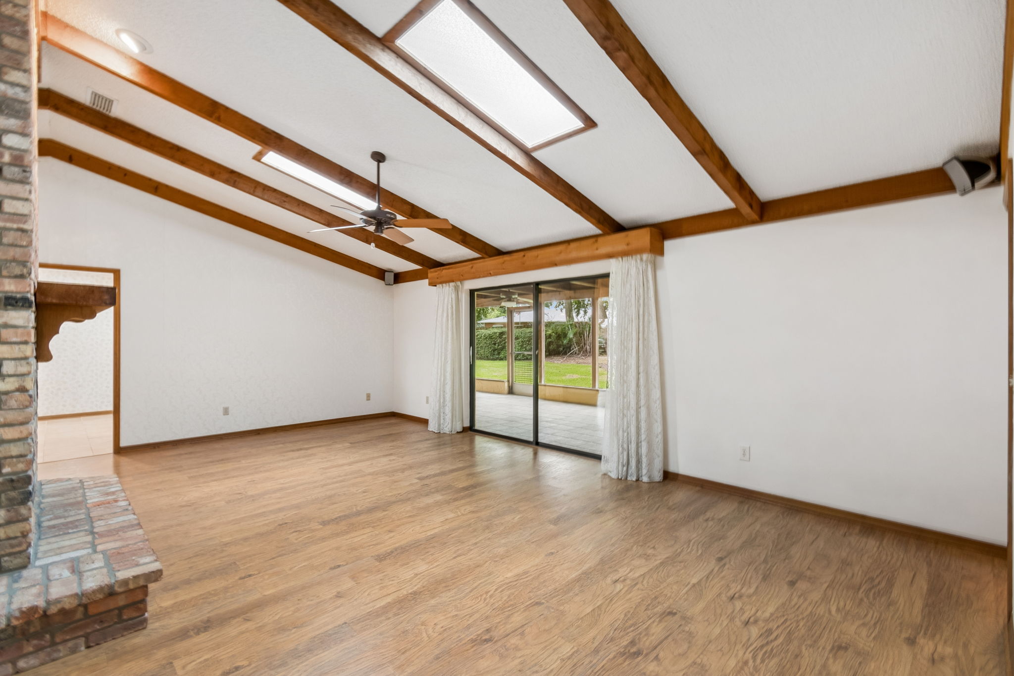 Cedar beams accent the vaulted ceiling