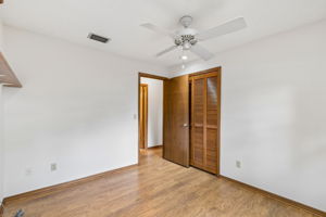 Bedroom 2 has built in shelving in closet