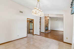 Tiled formal dining adjoins the foyer