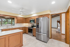 Updated maple cabinets and quartz countertops