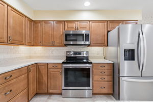 Stainless steel appliances and recessed lights