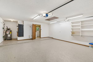 Oversized garage with attic pull down stairs