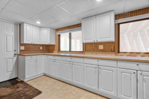 Huge laundry room could be a hobby room as well