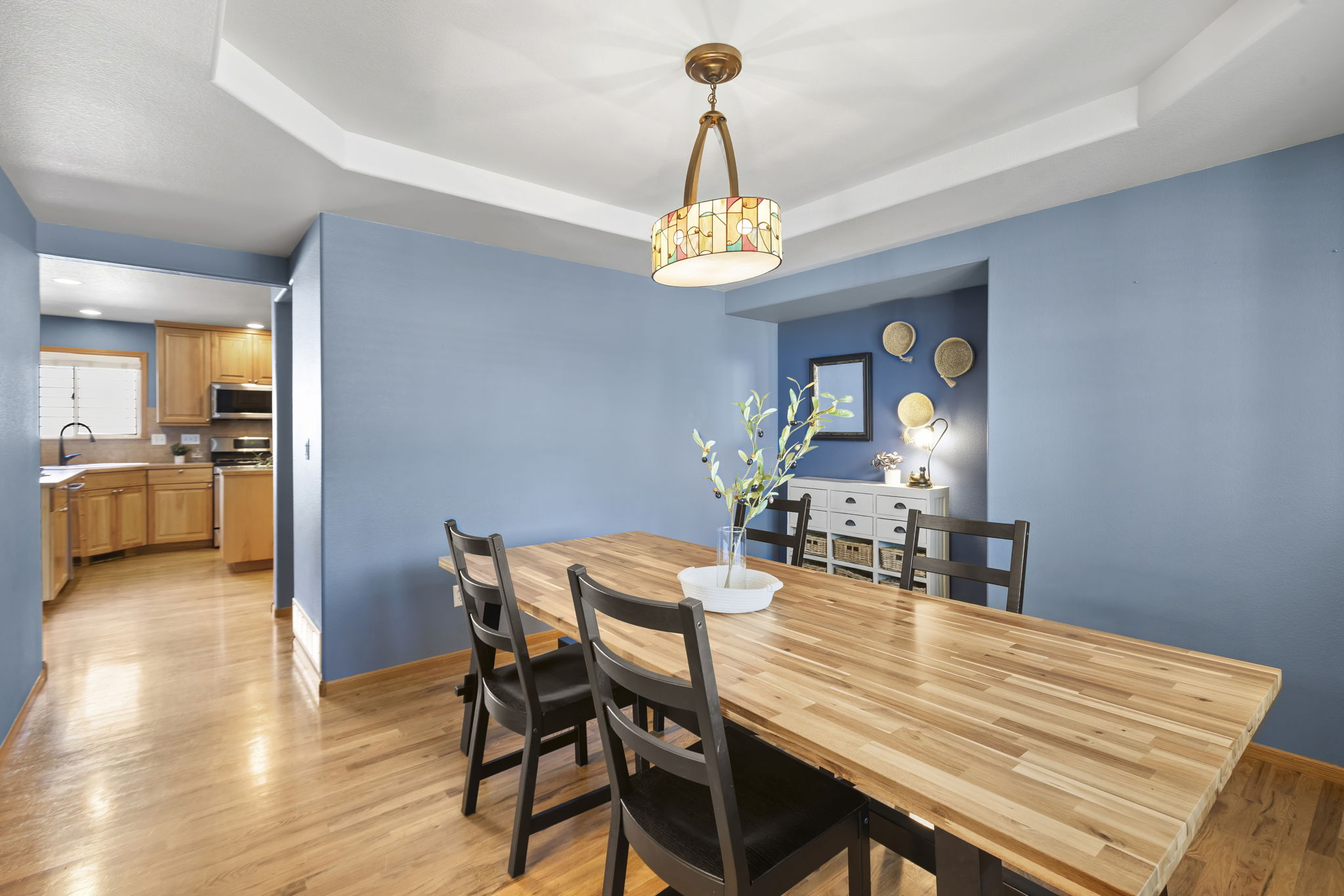 Easy access between kitchen and dining room and yet just separated enough to give a formal dining room feel. Dining room provides space for many to gather
