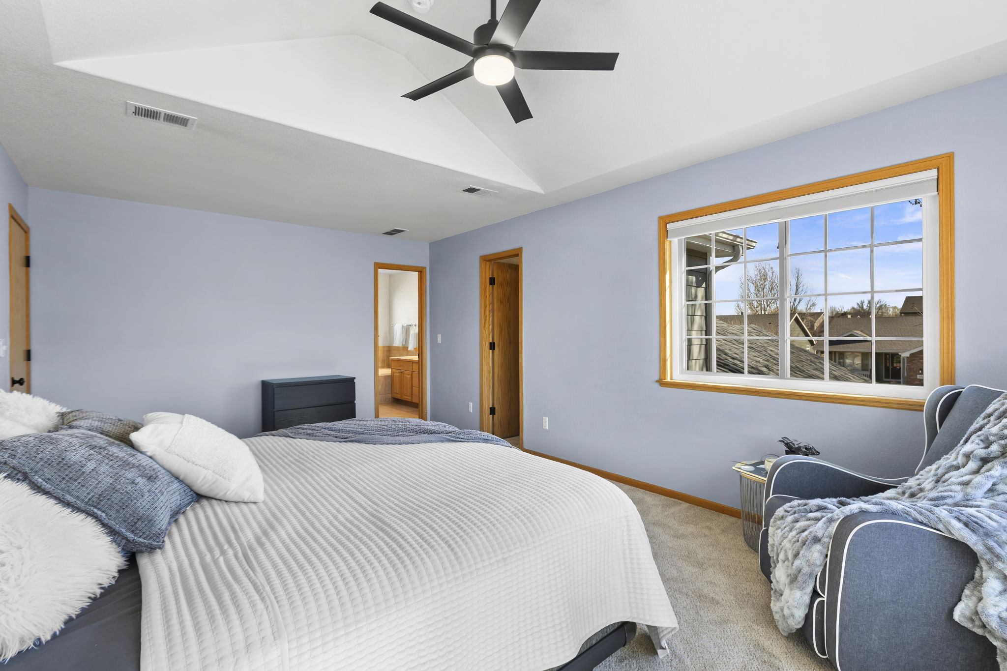 West facing primary bedroom with walk-in closet and ensuite bathroom