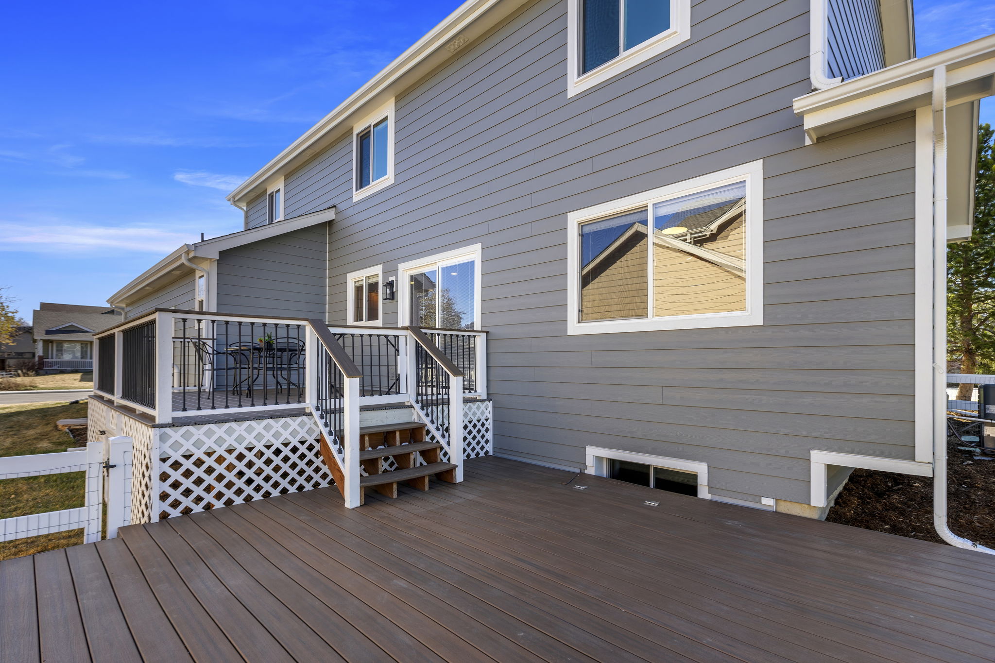 Back deck second landing. Many windows recently replaced