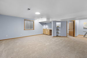 Rec room with built in bar. Brand new carpet
