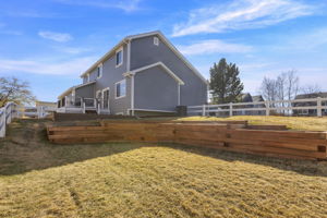 New grading, landscape design with retaining wall, sod and whole-yard irrigation system (2025)