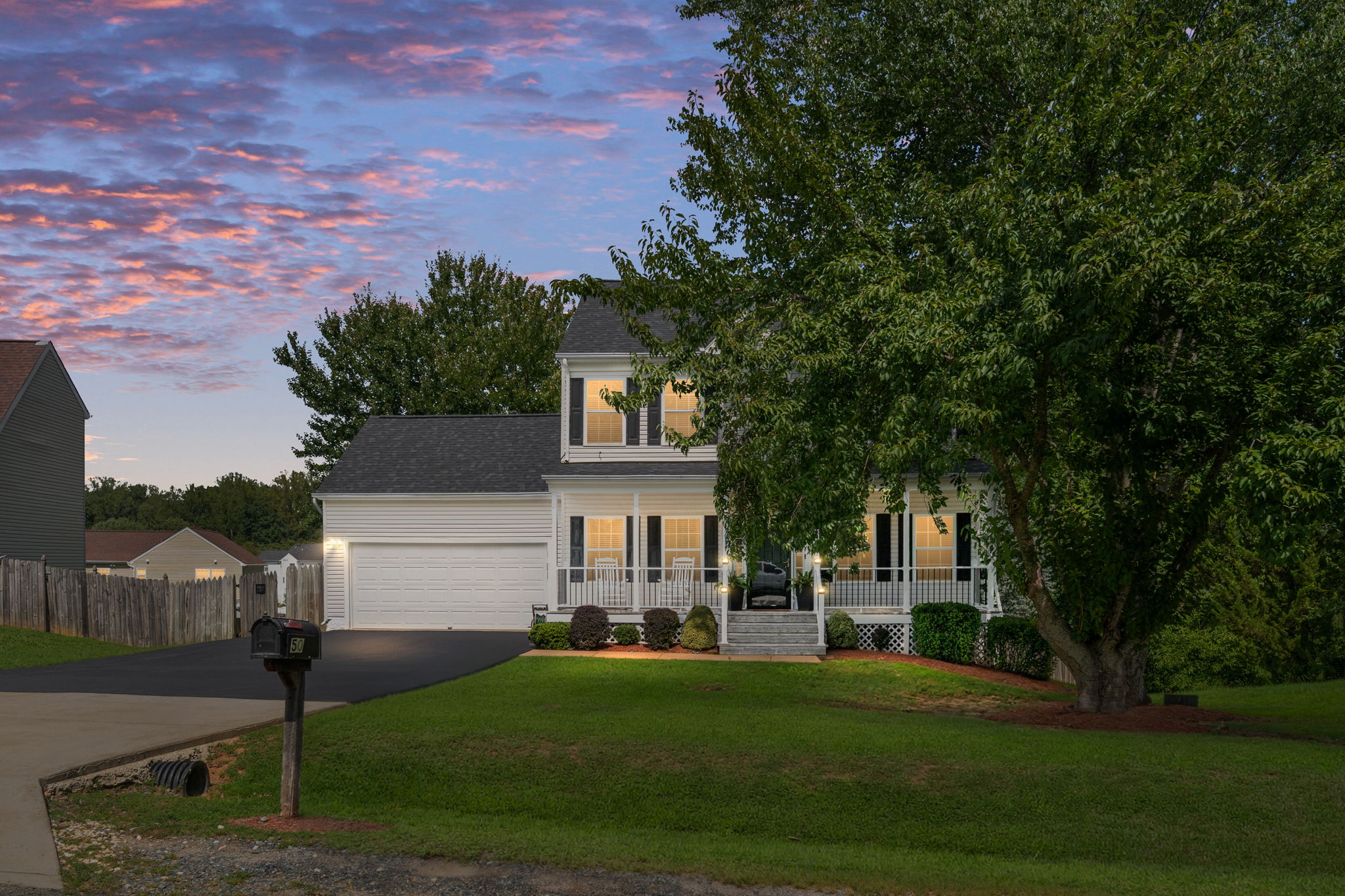 Twilight exterior marketing photograph of 50 Barclay Lane in Stafford Virginia