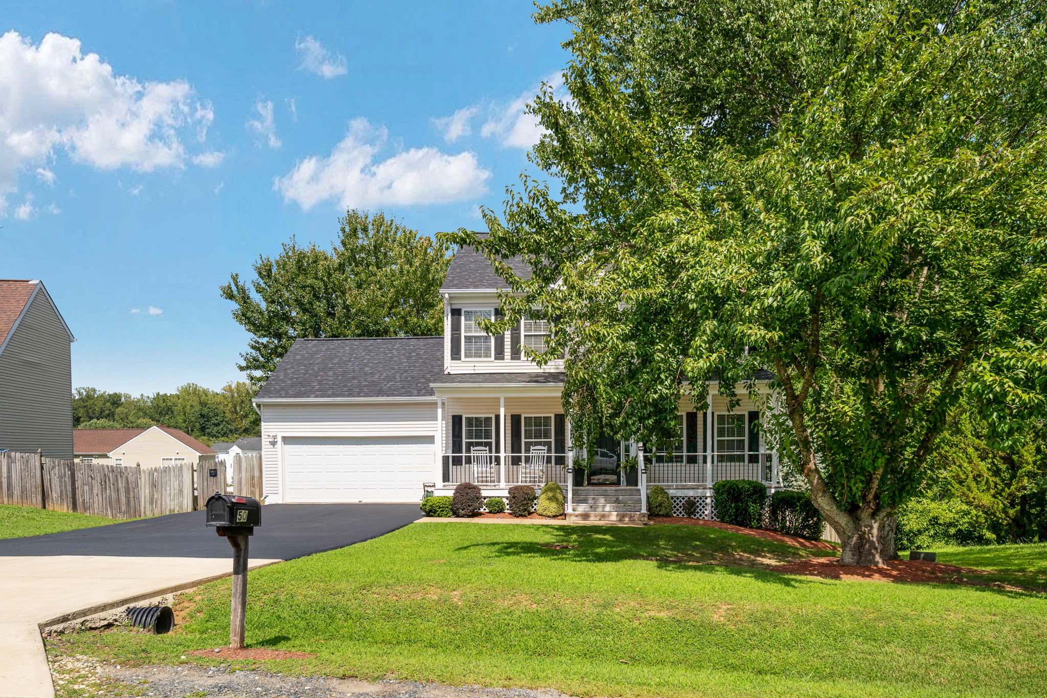 Professionally photographed Stafford home exterior at 50 Barclay Lane