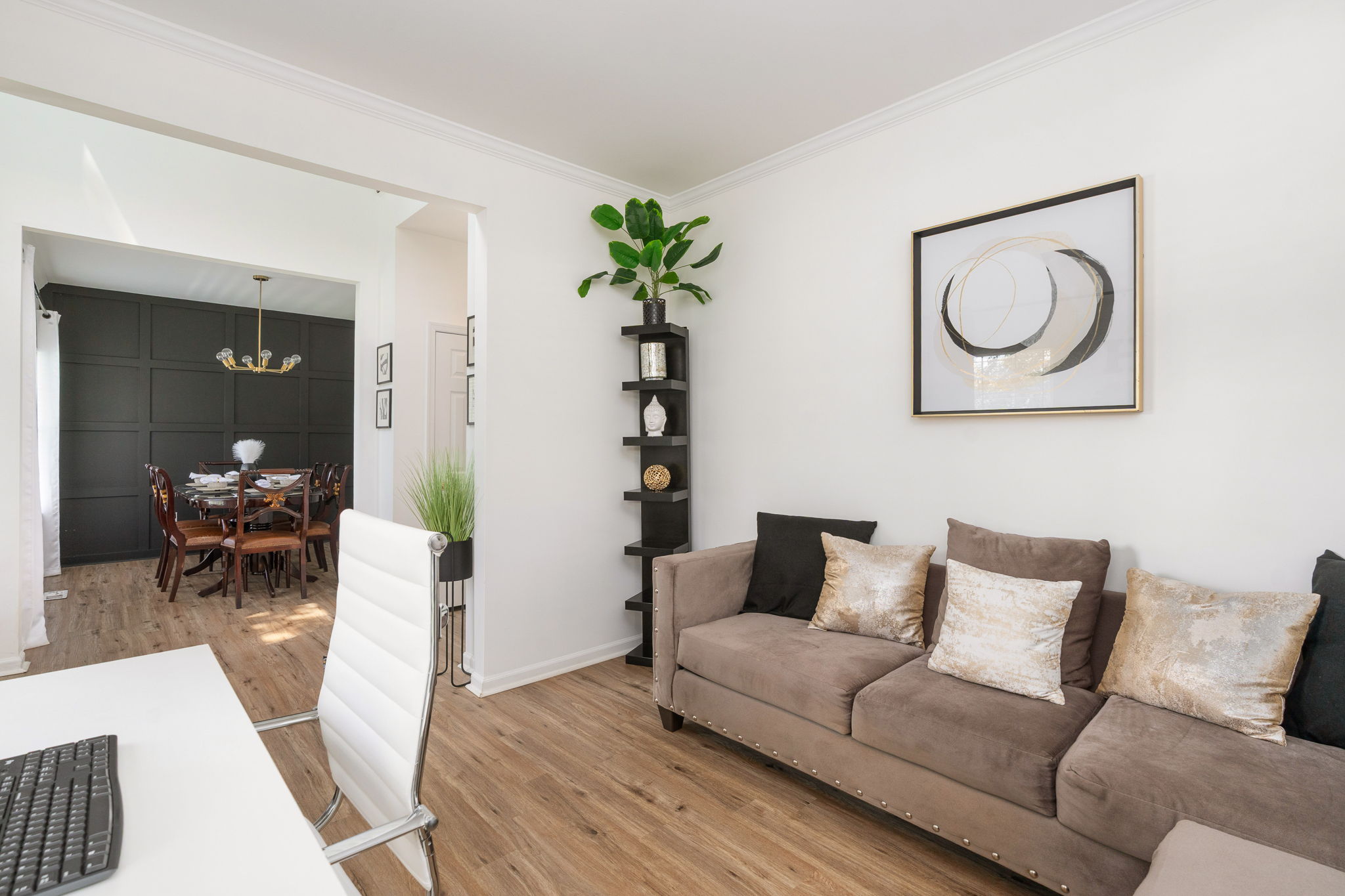 Bright professionally photographed living and dining area at 50 Barclay Lane