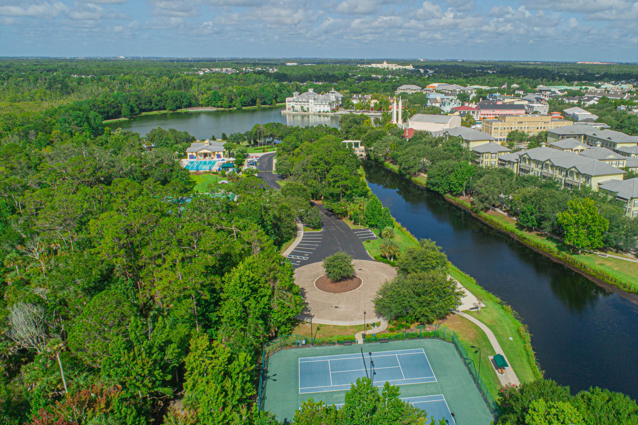 Aerial View of Tennis Courts, Canal, and Town