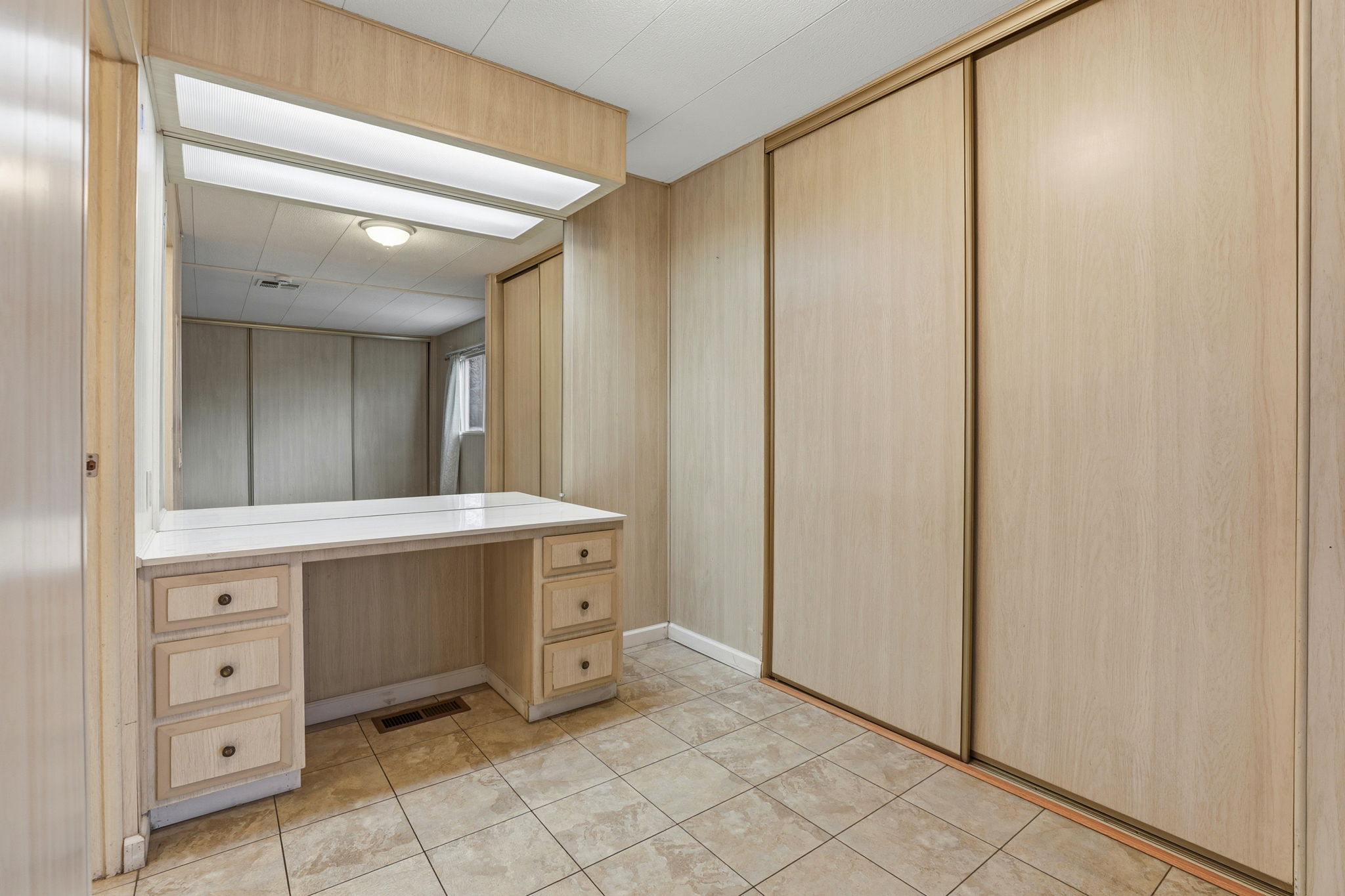 Additional closet in primary with Vanity