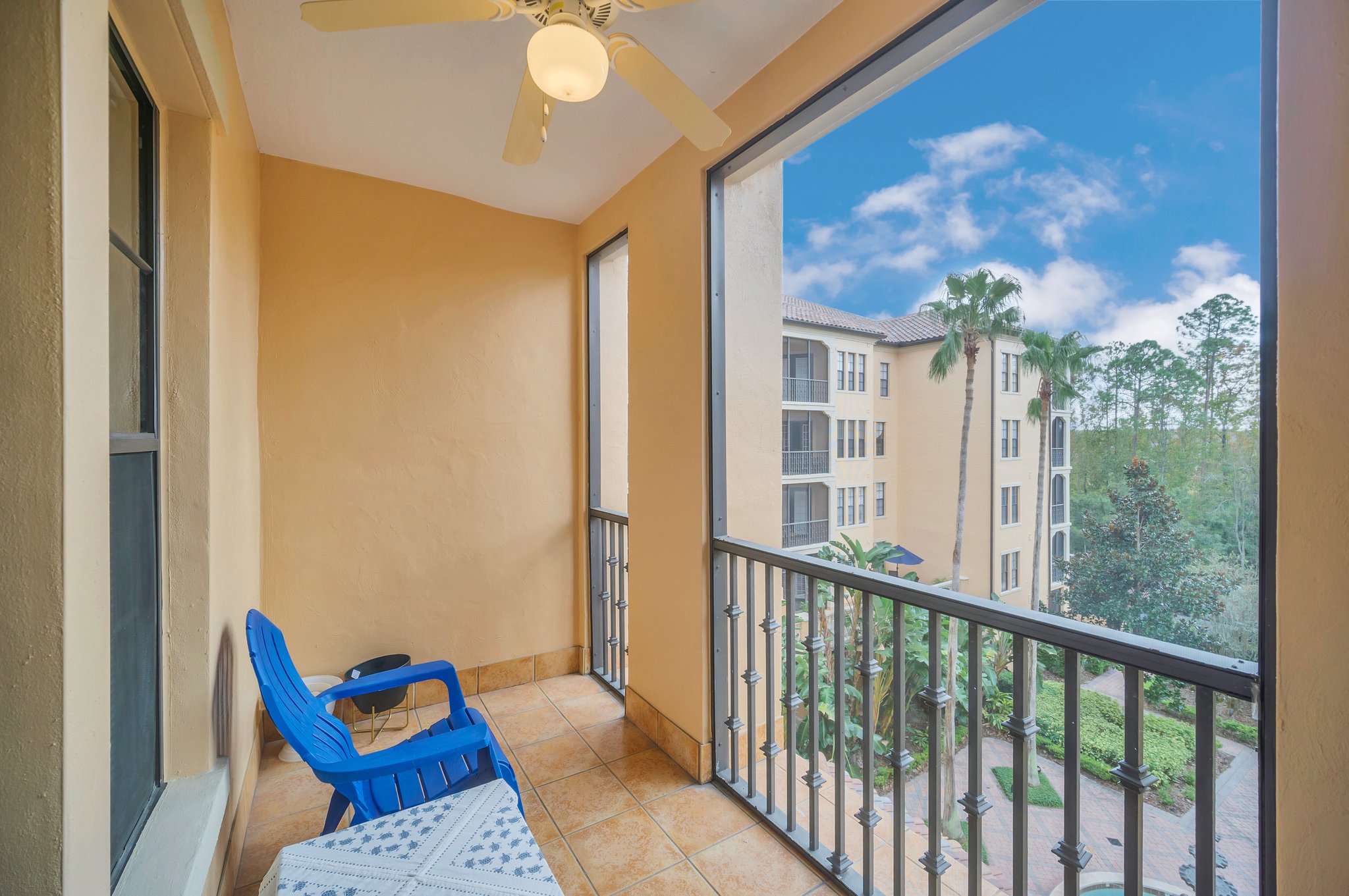 Screen Balcony Overlooking the Palm Courtyard