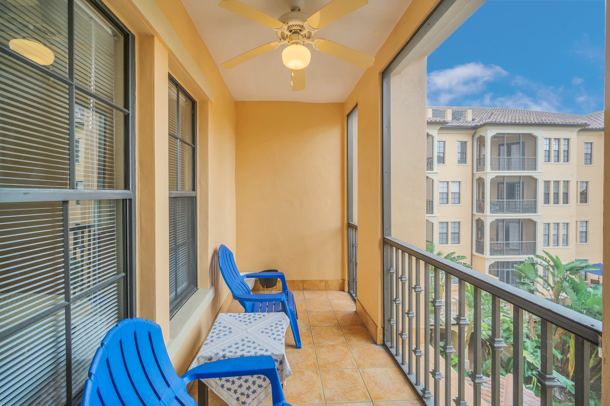 Screen Balcony Overlooking the Palm Courtyard