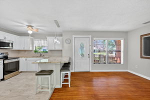 Foyer, Living Room, and Kitchen