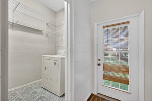 Interior Laundry Room with Exterior Door to Rear Patio