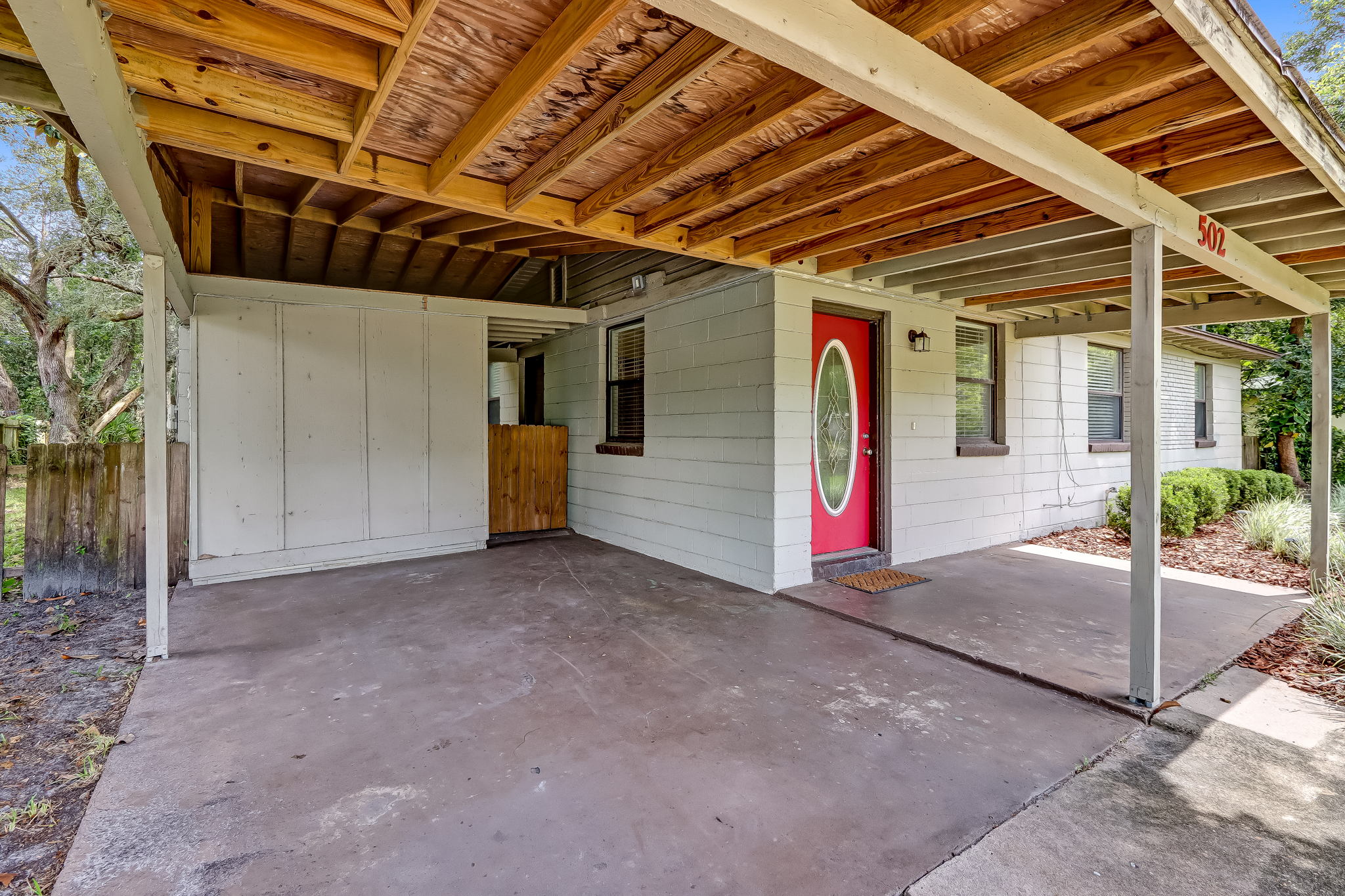 Roomy covered carport and front porch