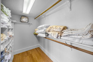 Upper Level Primary Bedroom Walk-in Closet1a