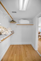 Upper Level Primary Bedroom Walk-in Closet1b