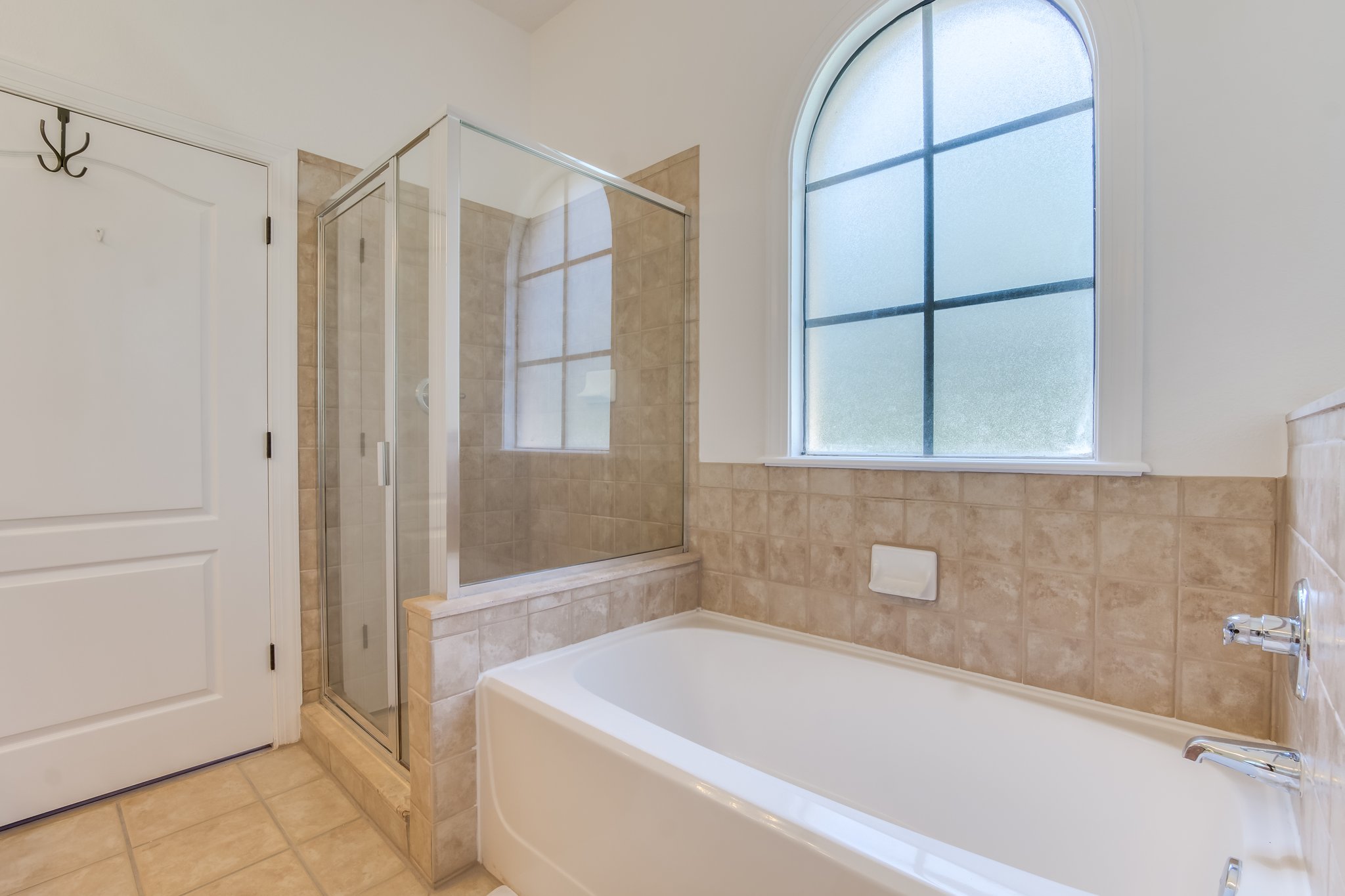 Main Master Bathroom with Soaking Tub and Separate Shower