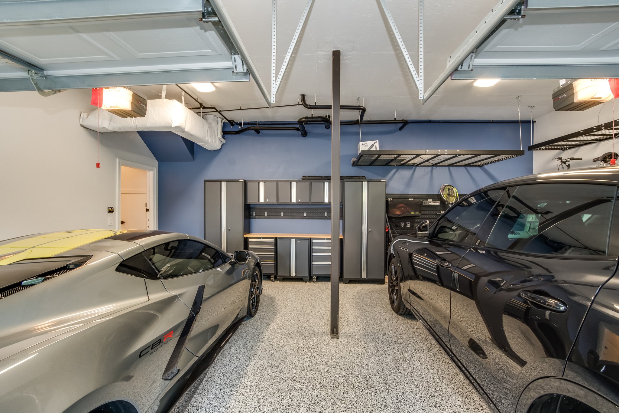 Large 2-Car Attached Garage with Epoxy Flooring & Storage Shelves