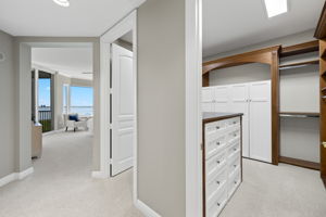 Primary Bedroom Walk-in Closet 1 of 2