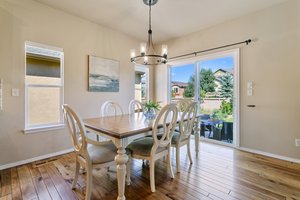 Dinning Area With Hard Wood Floors