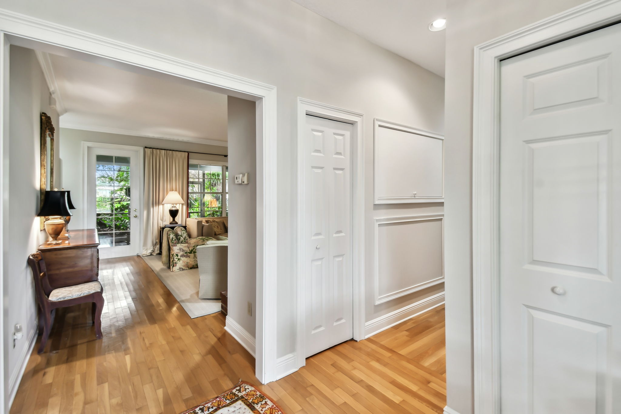 The foyer and hallway offer closet storage