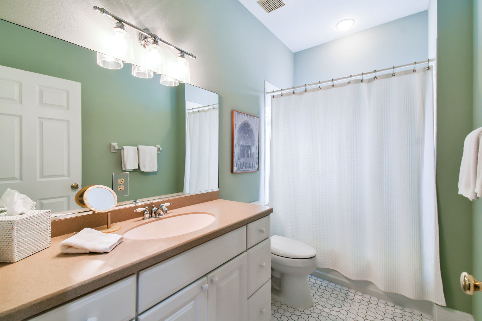 Guest Bathroom with tile flooring