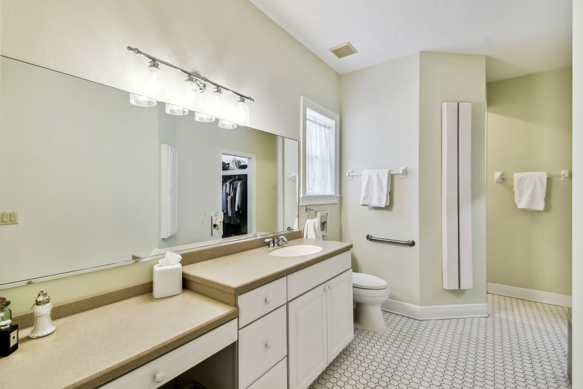 Large owner's bathroom with lots of storage