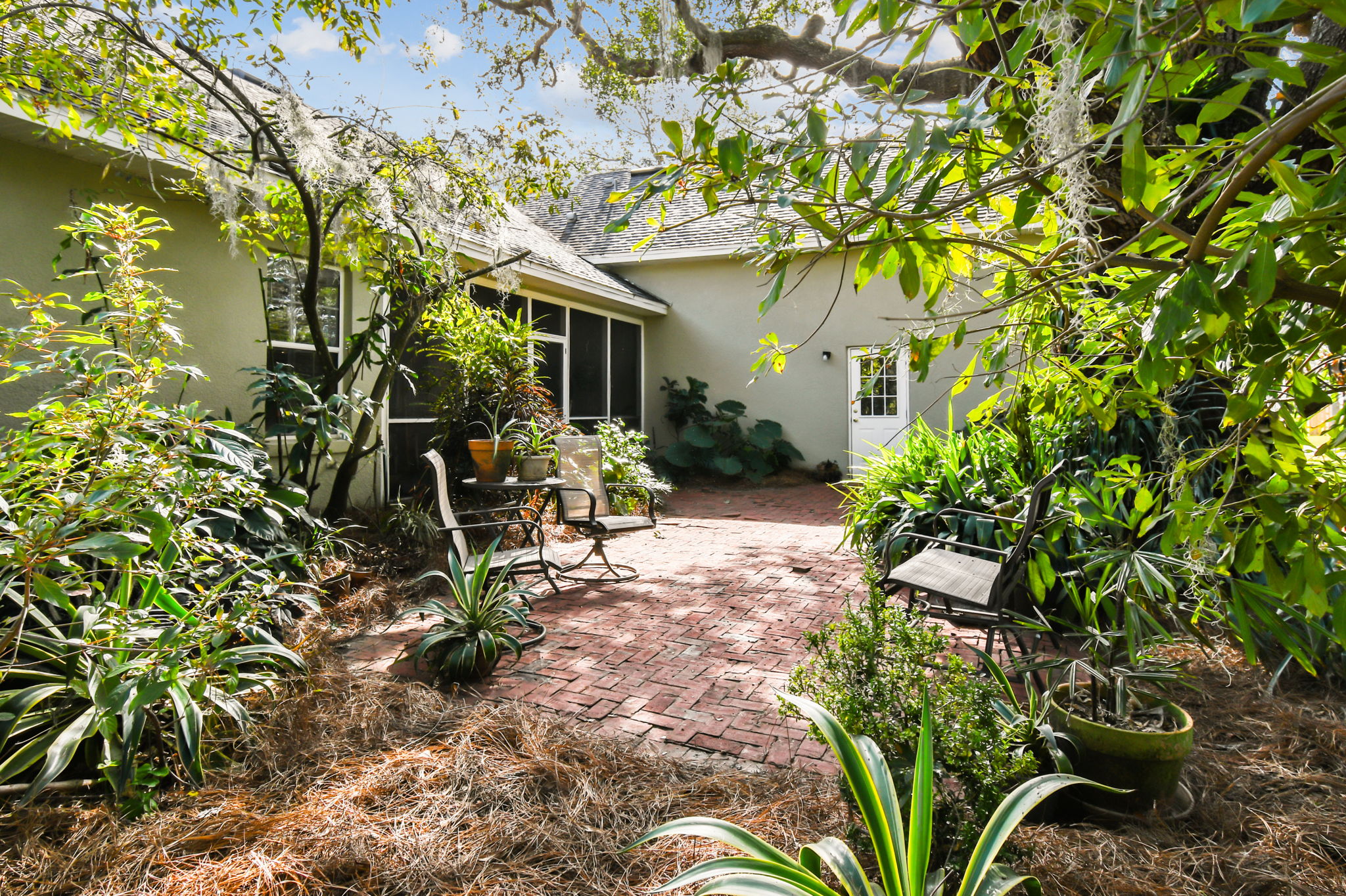 Backyard with private bonus room entrance thru garage