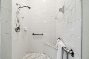 Owners Bathroom has Roll In Accessible Shower