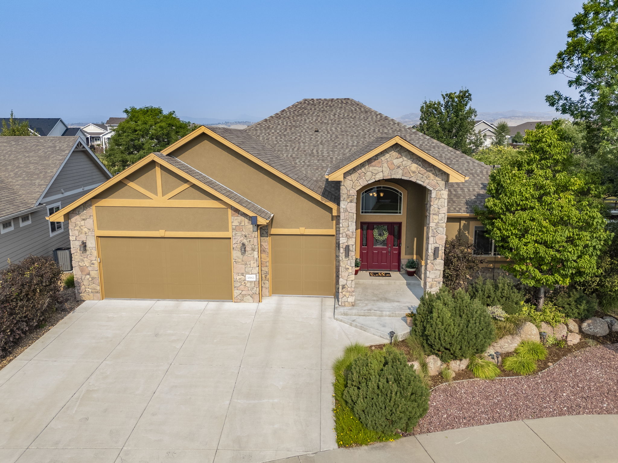 Huge 3 Car Garage and Beautiful Landscaping