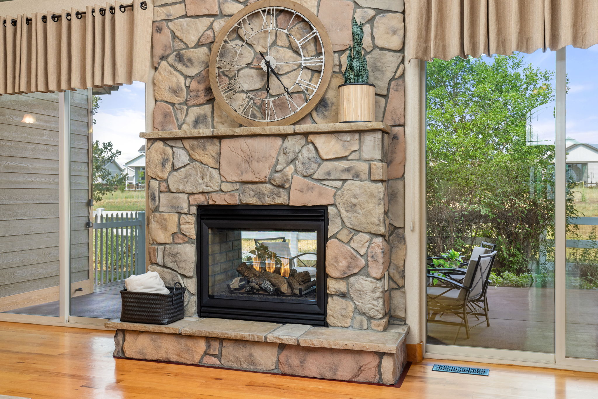 Double Sided Fireplace Between Dual Sliders Marry Your Indoor and Outdoor Living Areas