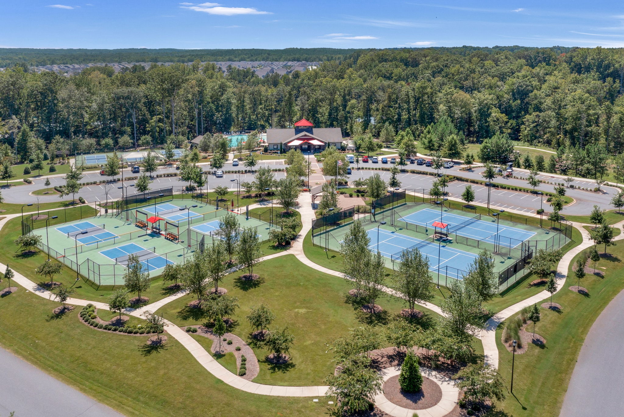 Amenities including Pickleball, tennis, fitness center, bocce, horseshoe pit, and more.