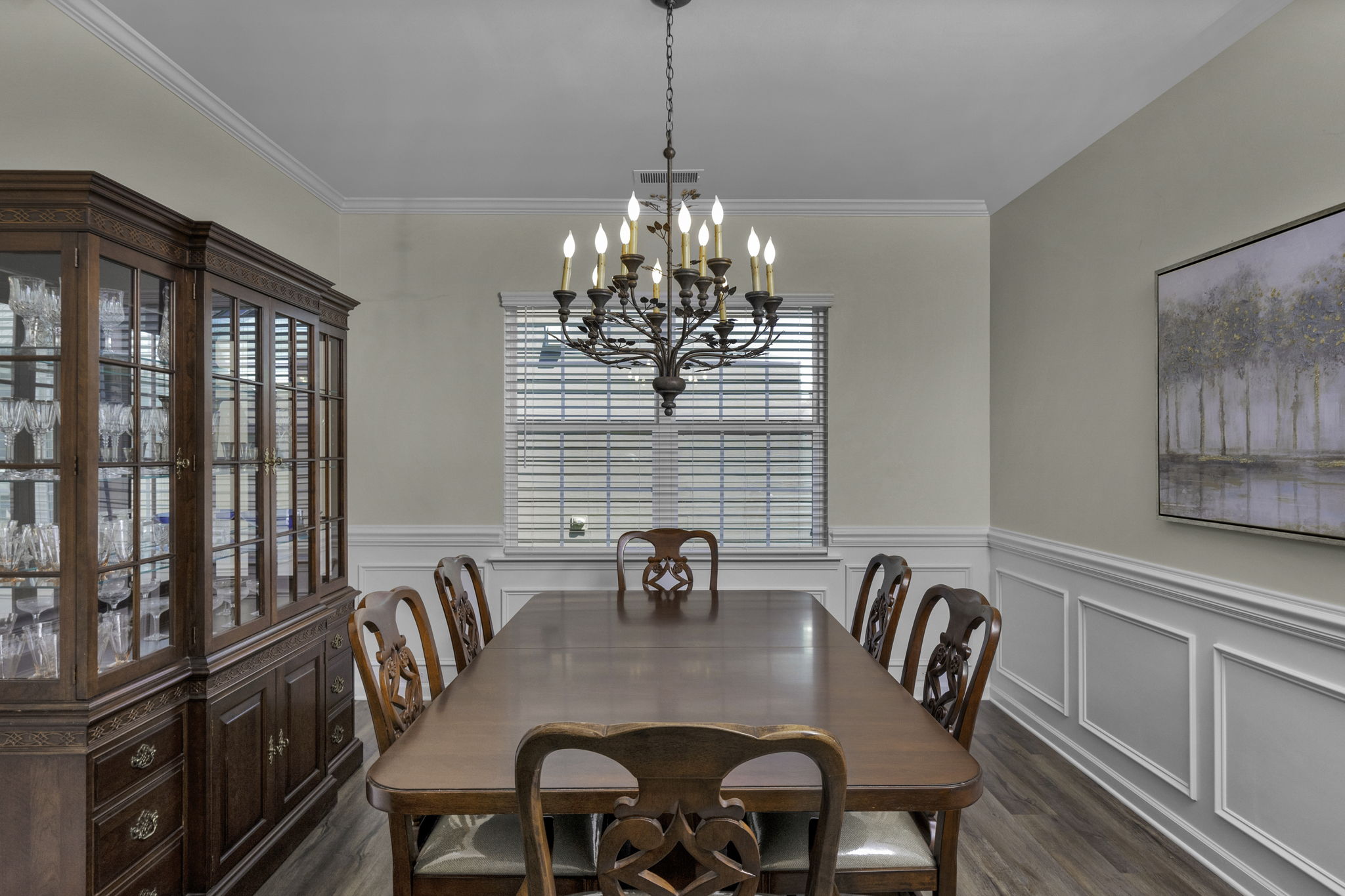 Dining Room with Antique Chandelier and Elegant Moldings