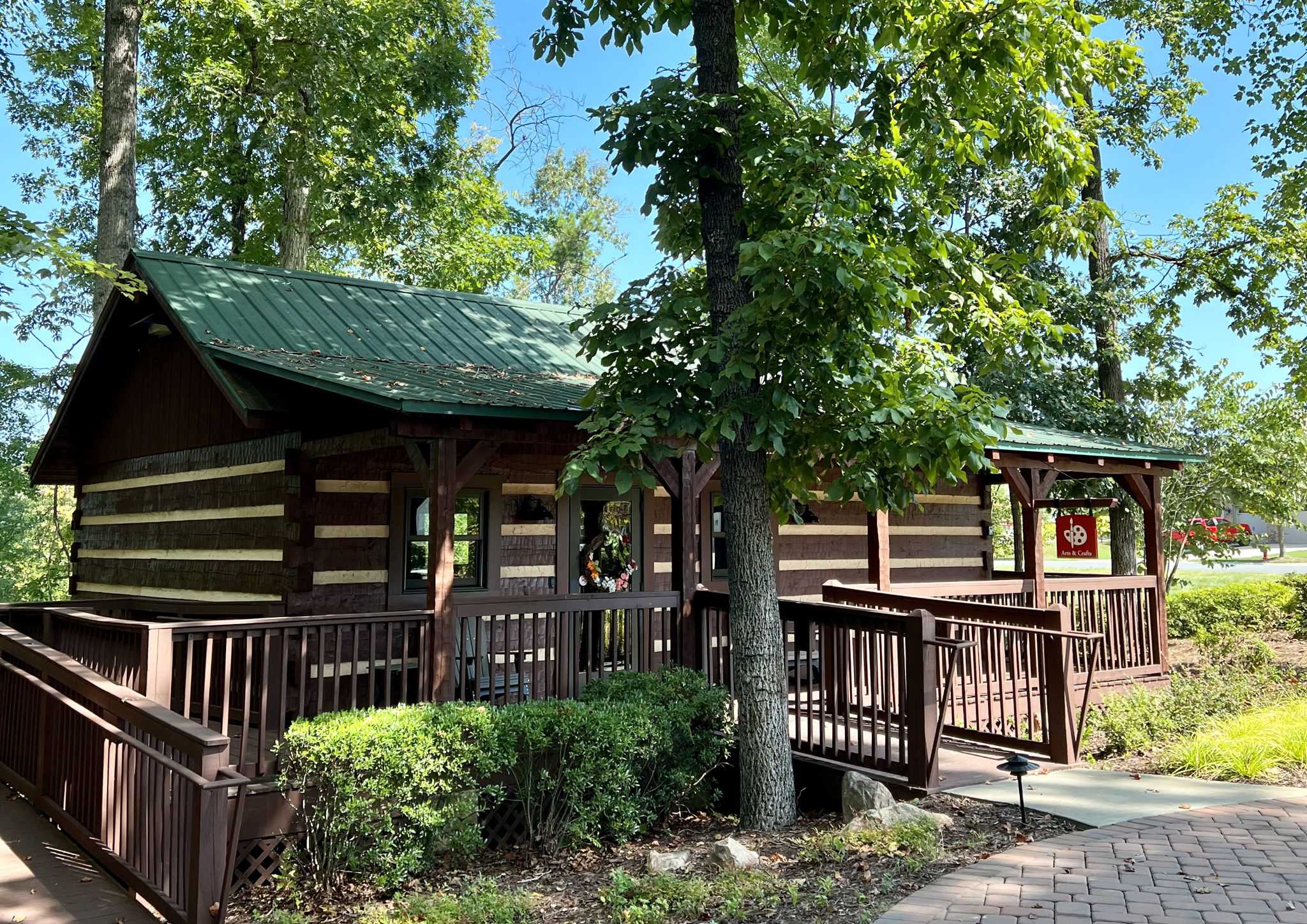 Log Cabins: #1 Arts and Crafts, #2 Multi-purpose Cabin, #3 Post Office, #4 Reading, #5 Business, #6 Sewing, #7 Fitness, #8 Cards, #9 Celebration Cabin, #10 Billiards
