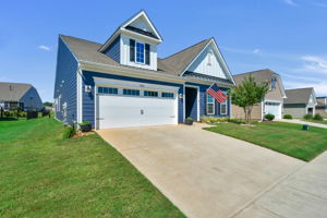 Home looks out onto green space/park across the street.