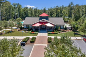 Tree Tops Clubhouse with social room and kitchen on first level and fitness center on the lower level.