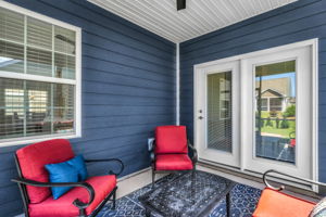 Screen porch off primary bedroom perfect for relaxing outdoors.