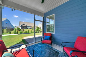 Screen porch opens to outdoor patio.