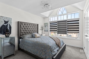 Big bedroom with cathedral ceiling