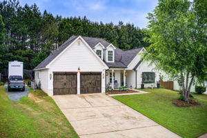 39 Aerial Ext Side + Front w RV Parking Pad