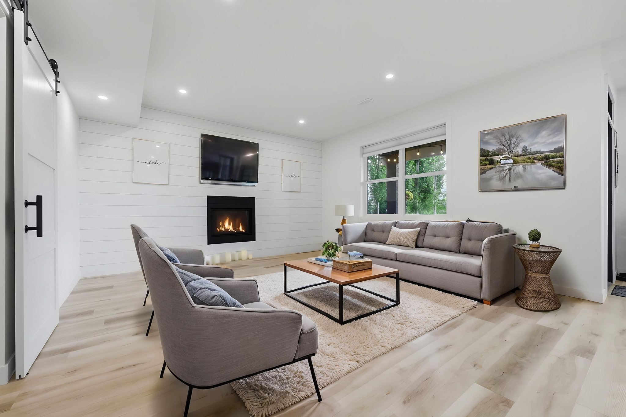 046_DT6A4382_with_fire virtually staged.jpeg